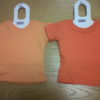 The difference in colour between our child (left) and adult (right) t-shirts.