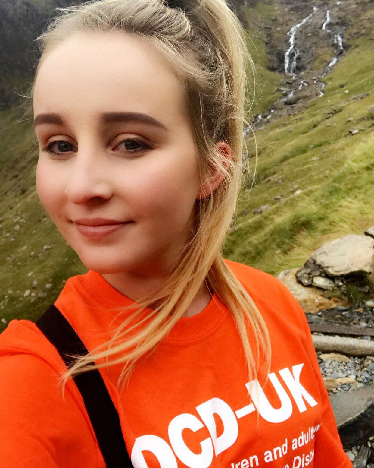 Hannah Nelson wearing an OCD orange t-shirt